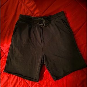 Waistband with covered elastic and drawstring.